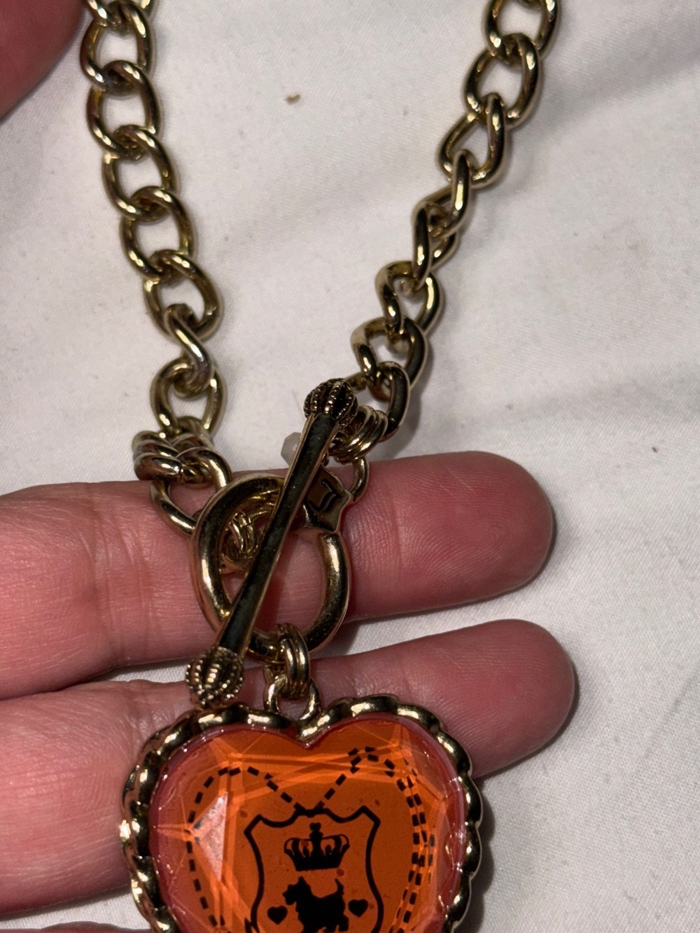Juicy couture gold and  heart charm necklace